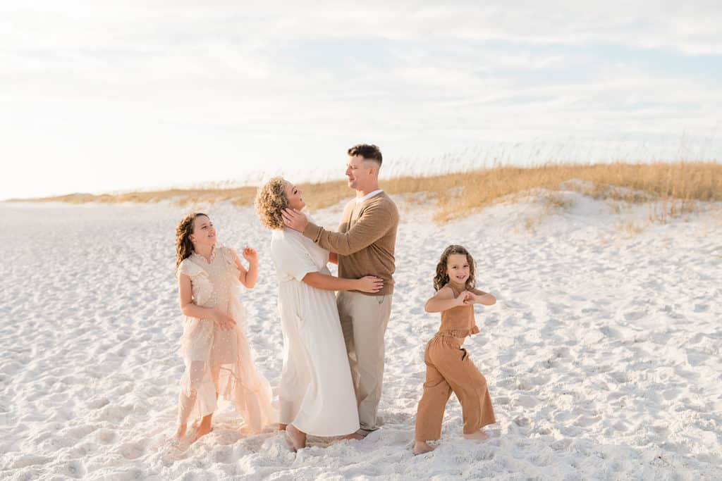 a family having fun at the beach by Andrea Krey, one of Destin Florida photographers