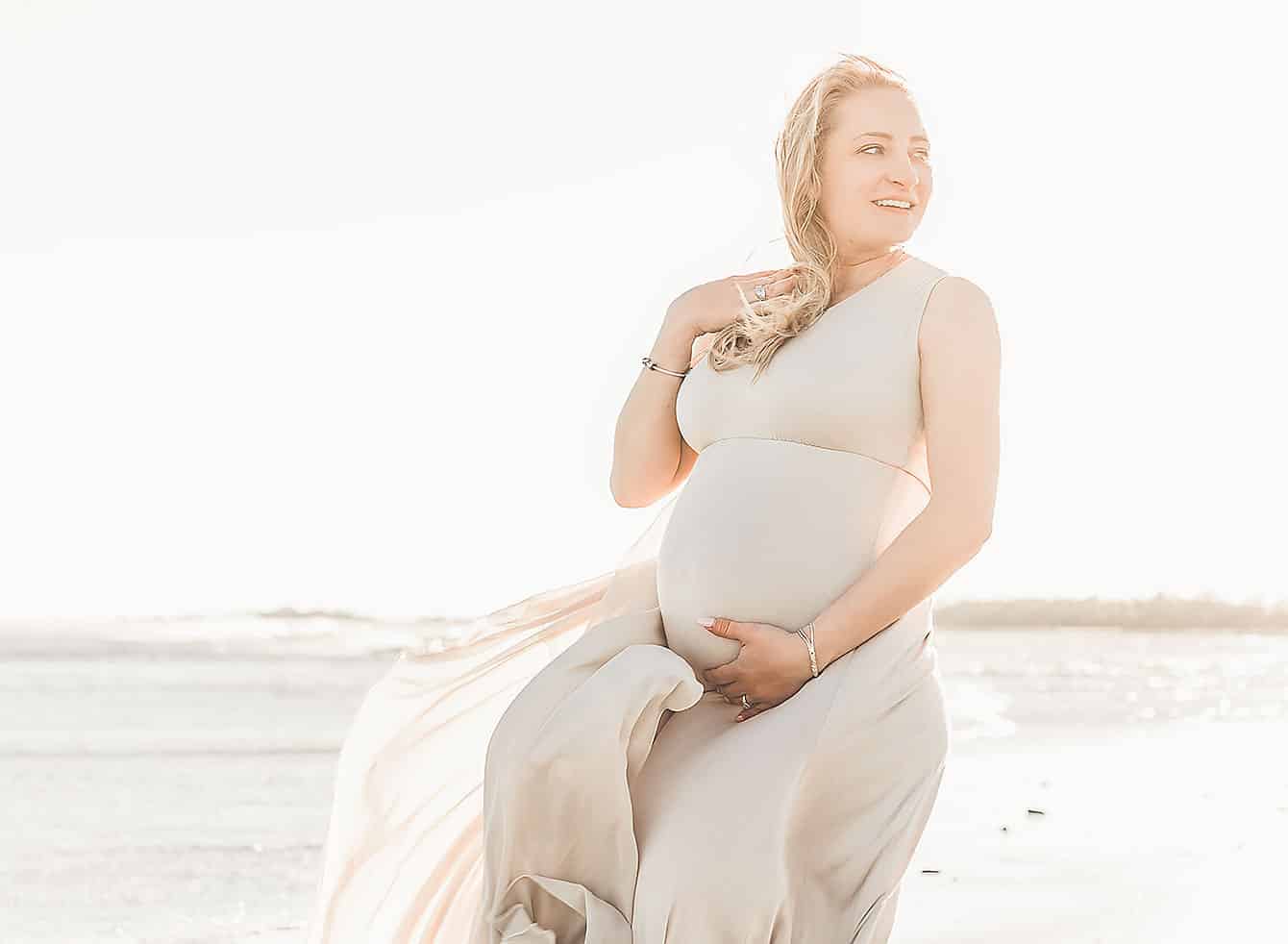 pregnant woman on florida baby moon vacation in destin fl