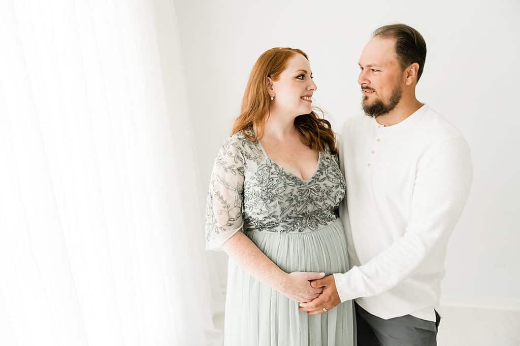 happy pregnant couple photographed by Andrea Krey photography
