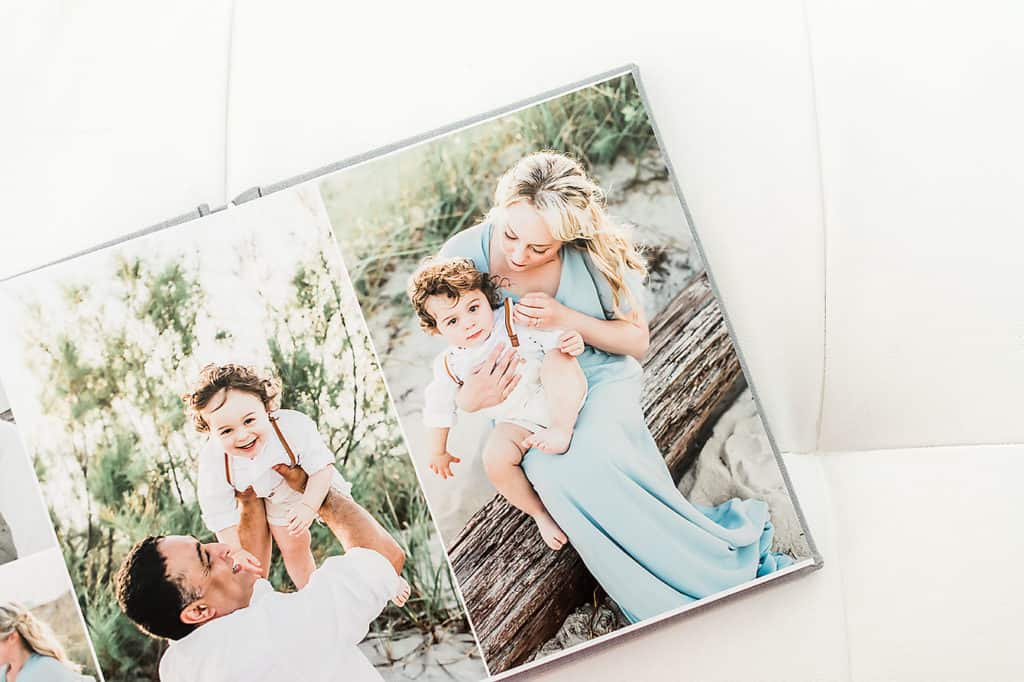 family photos in an album, designed by Emerald Coast photographer