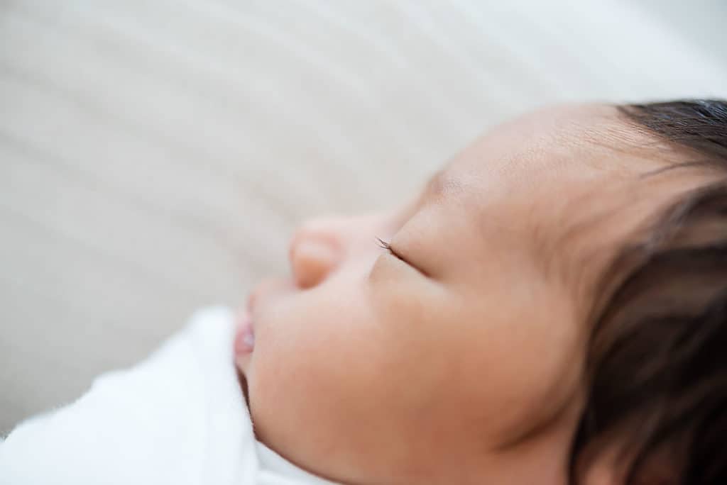 profile picture of a sleeping newborn