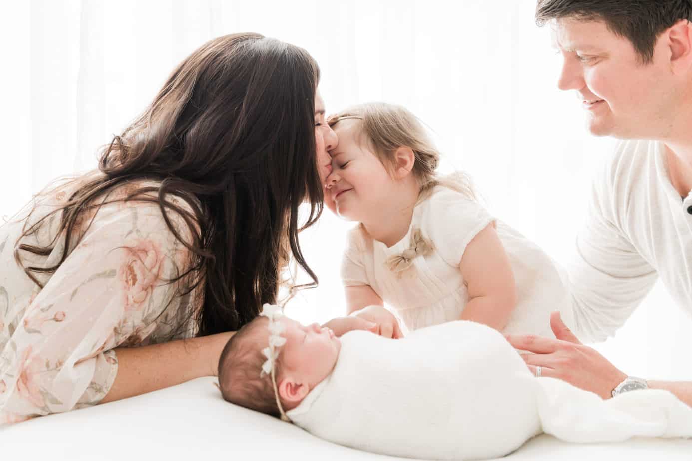happy family with their newborn baby
