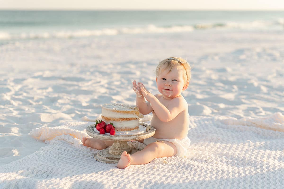 Birthday party venues in Pensacola &mdash; one year cake smash session on Destin beach by Andrea Krey Photography