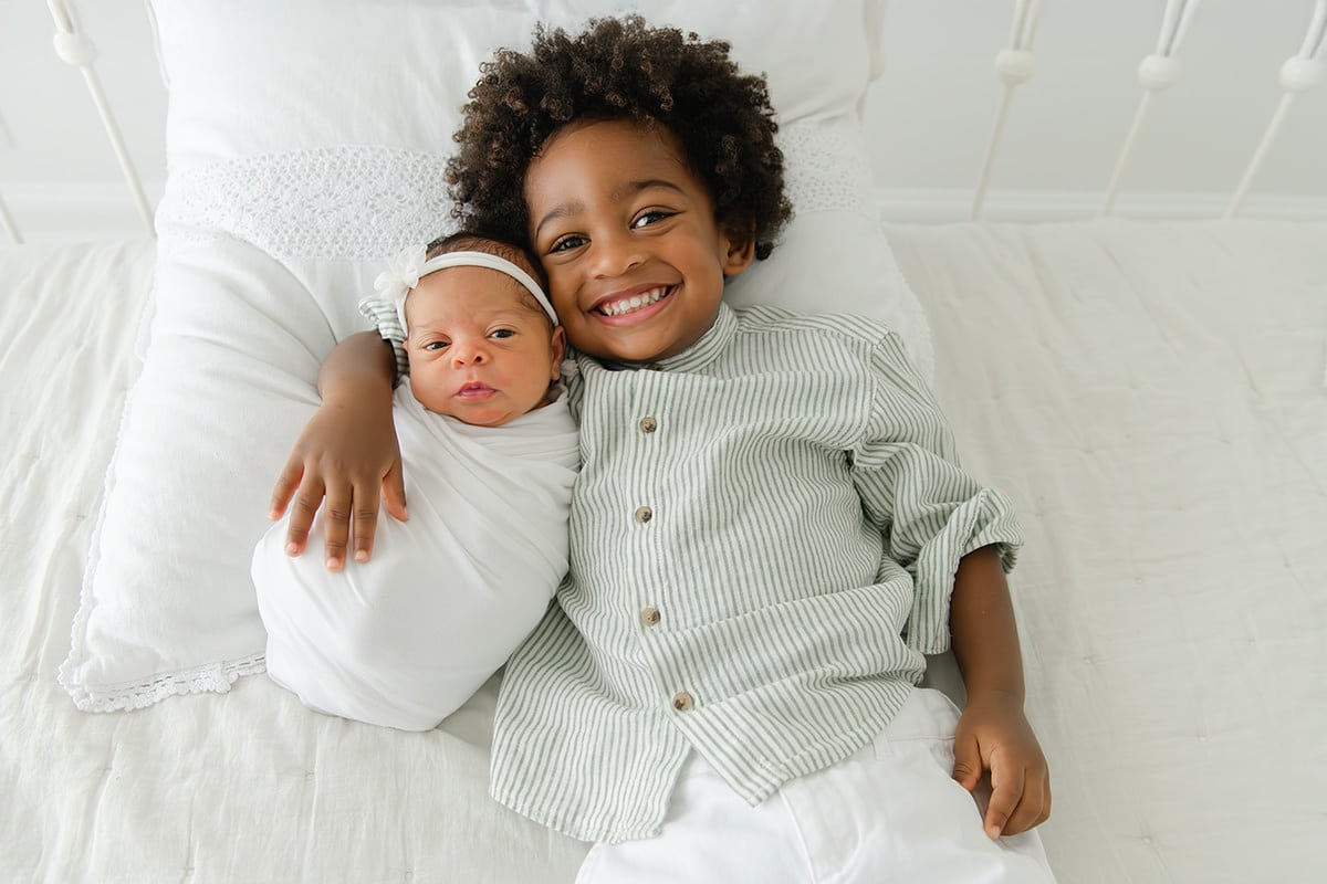 Newborn baby with big brother at Niceville studio — Andrea Krey Photography, serving Destin and Pensacola area families