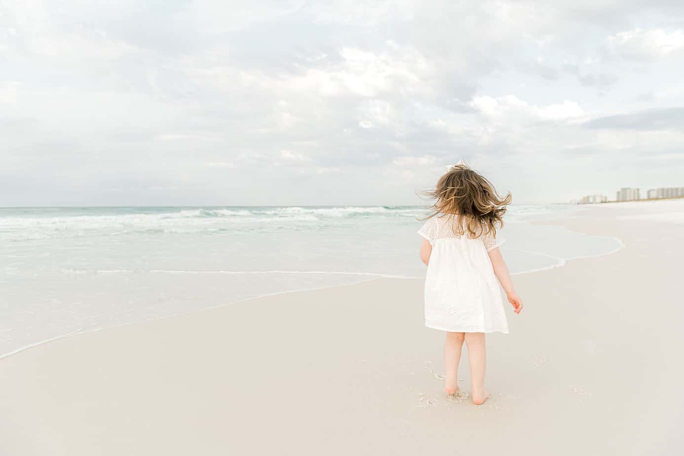 little girl twirling at Grayton Beach