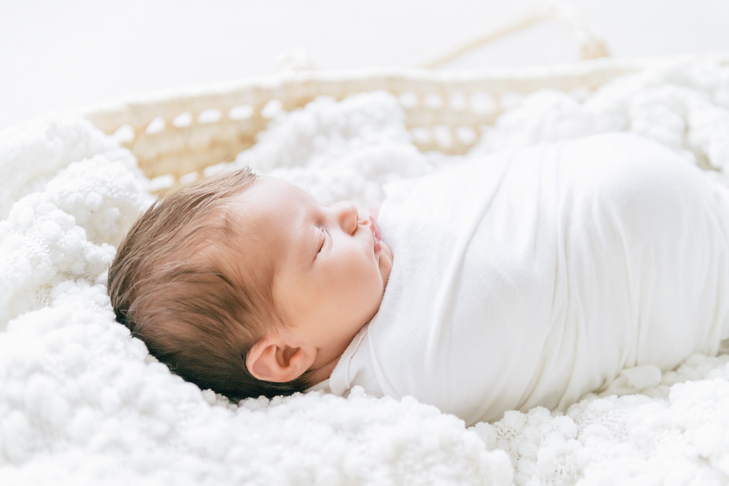 profile picture of a newborn baby sleeping