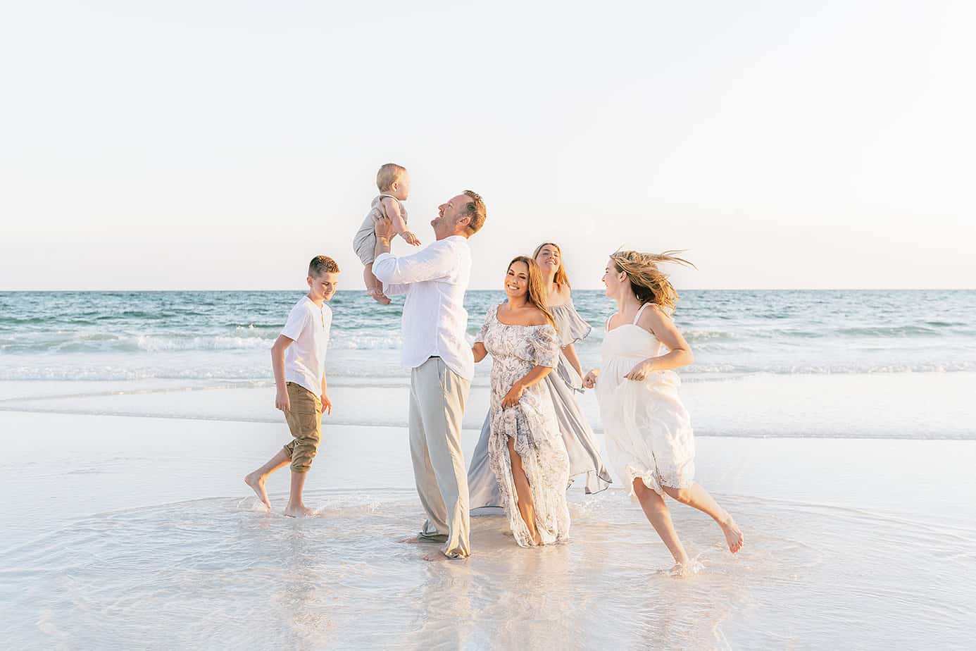 family photographer in Crestview Florida having fun with a family