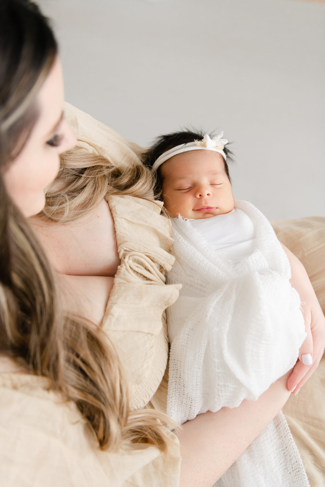 baby smirking on her newborn photo