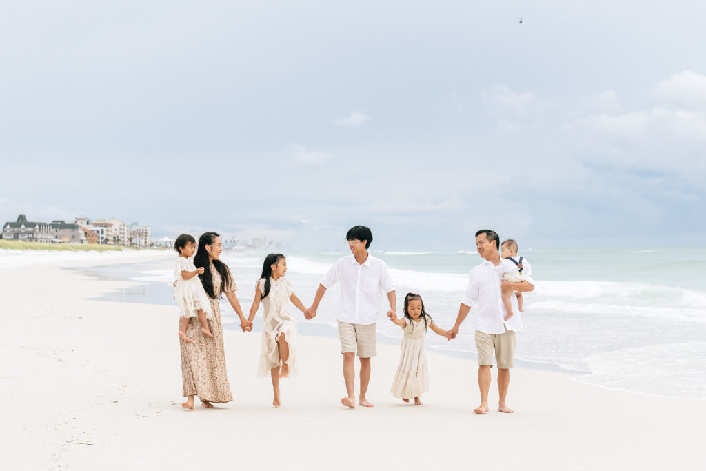 a family on a beach walk