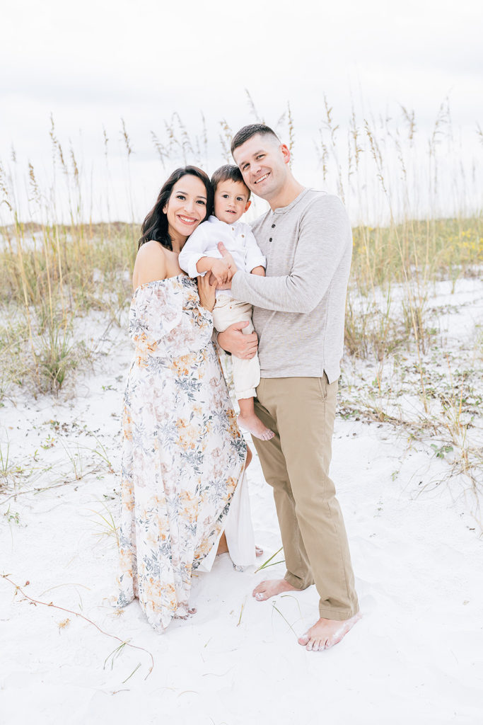 a family posing for Florida photographer