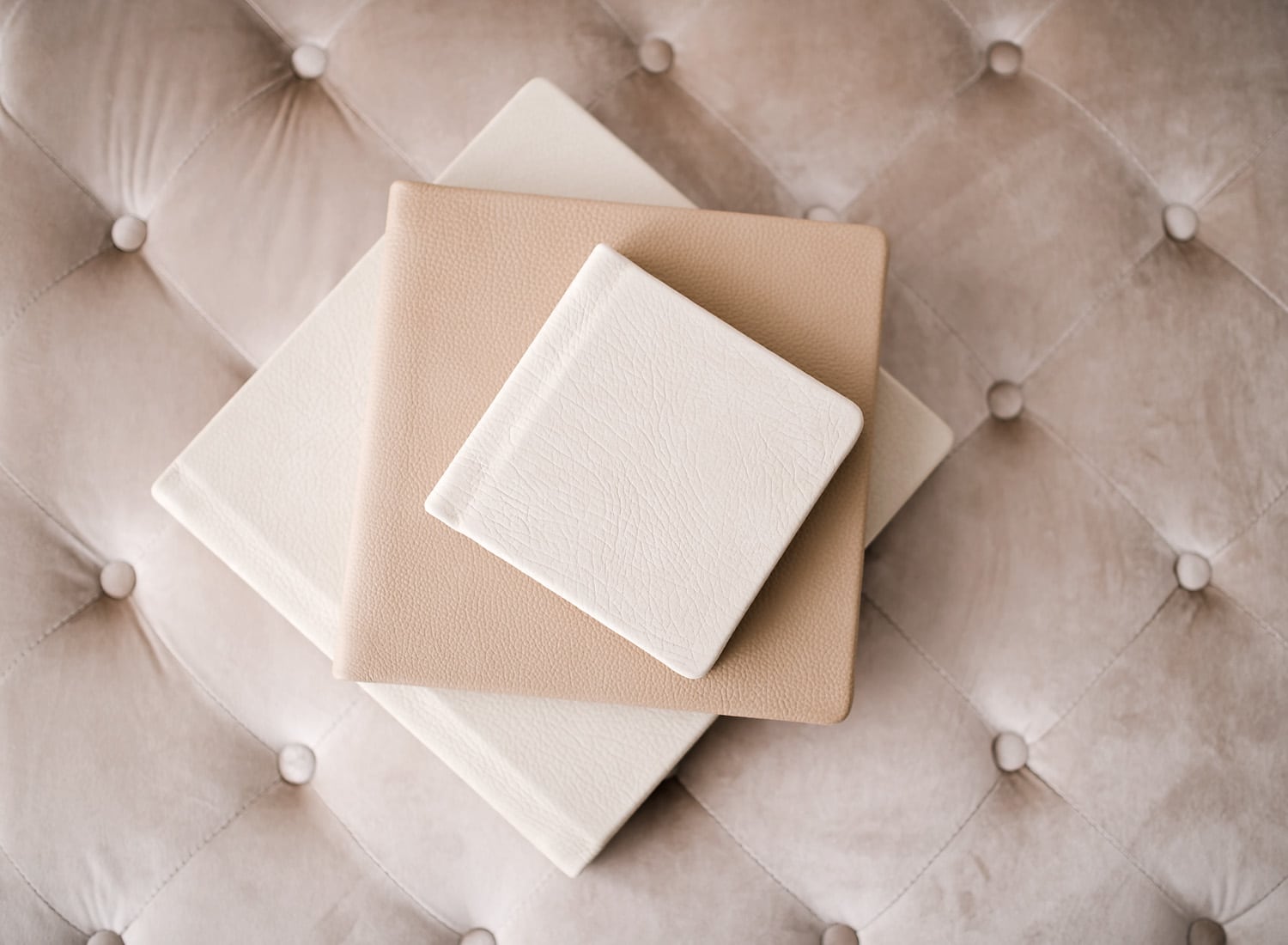 heirloom albums vs digital files - leather bound family photo albums in cream and tan
